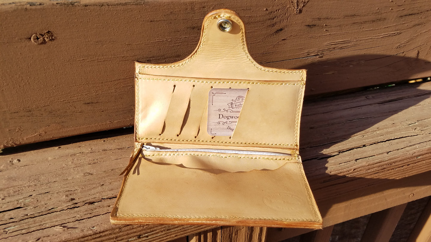 Tooled leather clutch wallet