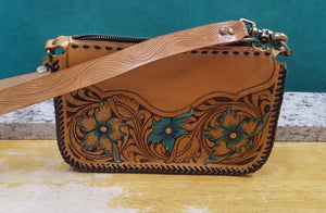 Purse with turquoise flowers and leather braiding