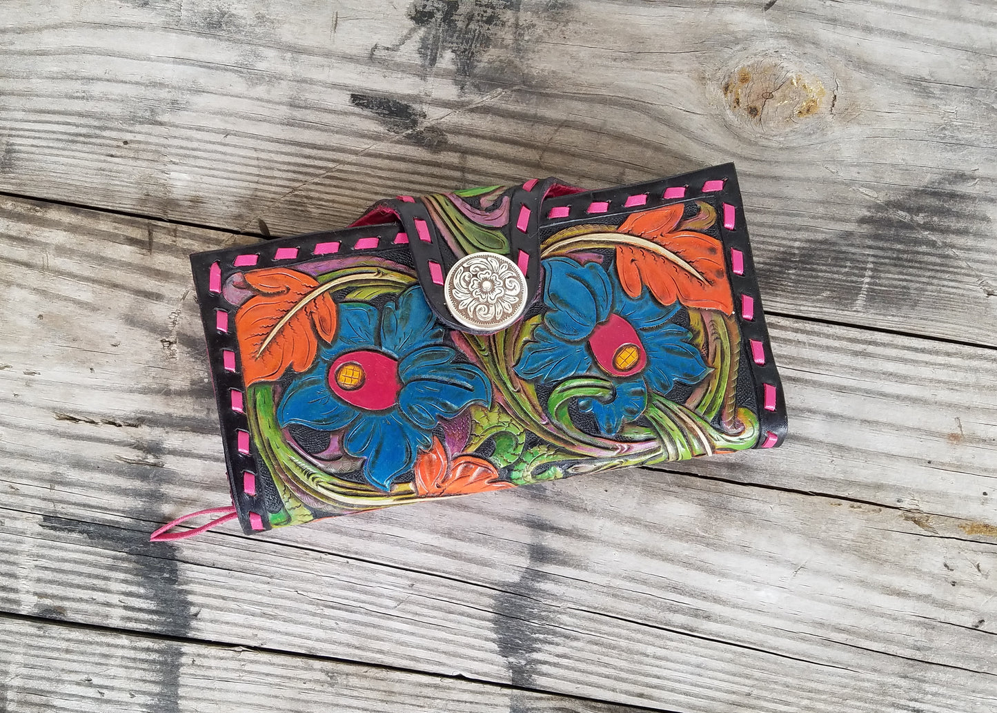 Colorful hand tooled leather clutch wallet