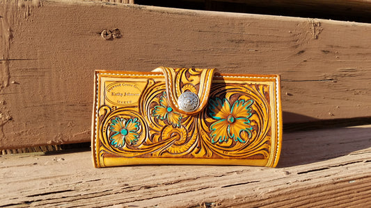 Tooled leather clutch wallet