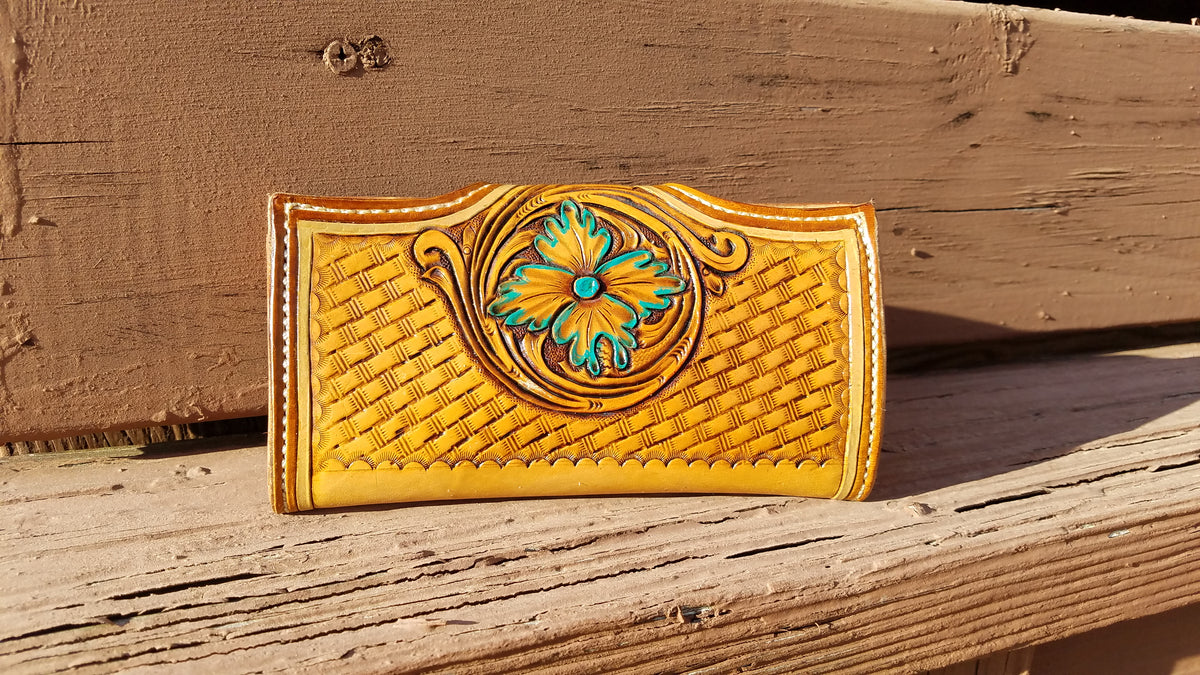 Tooled leather clutch wallet